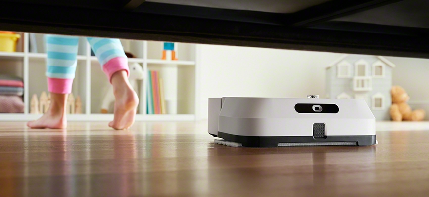 iRobot's m6 braava cleaning under couch