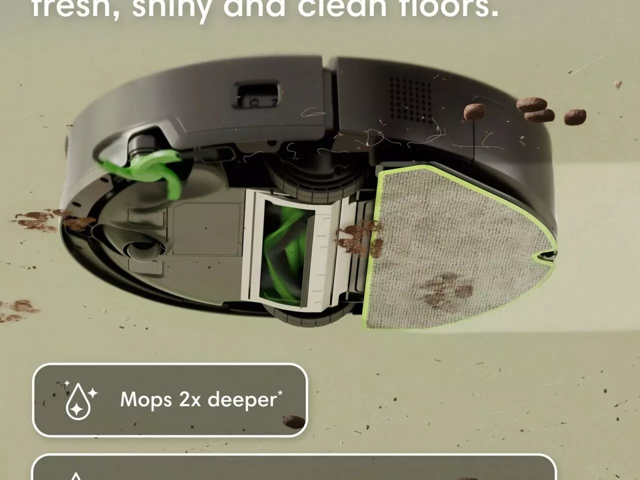 มุมมองด้านล่างของ Roomba® 115 Combo robot ขณะแผ่นม็อบไมโครไฟเบอร์หมุนทำความสะอาด