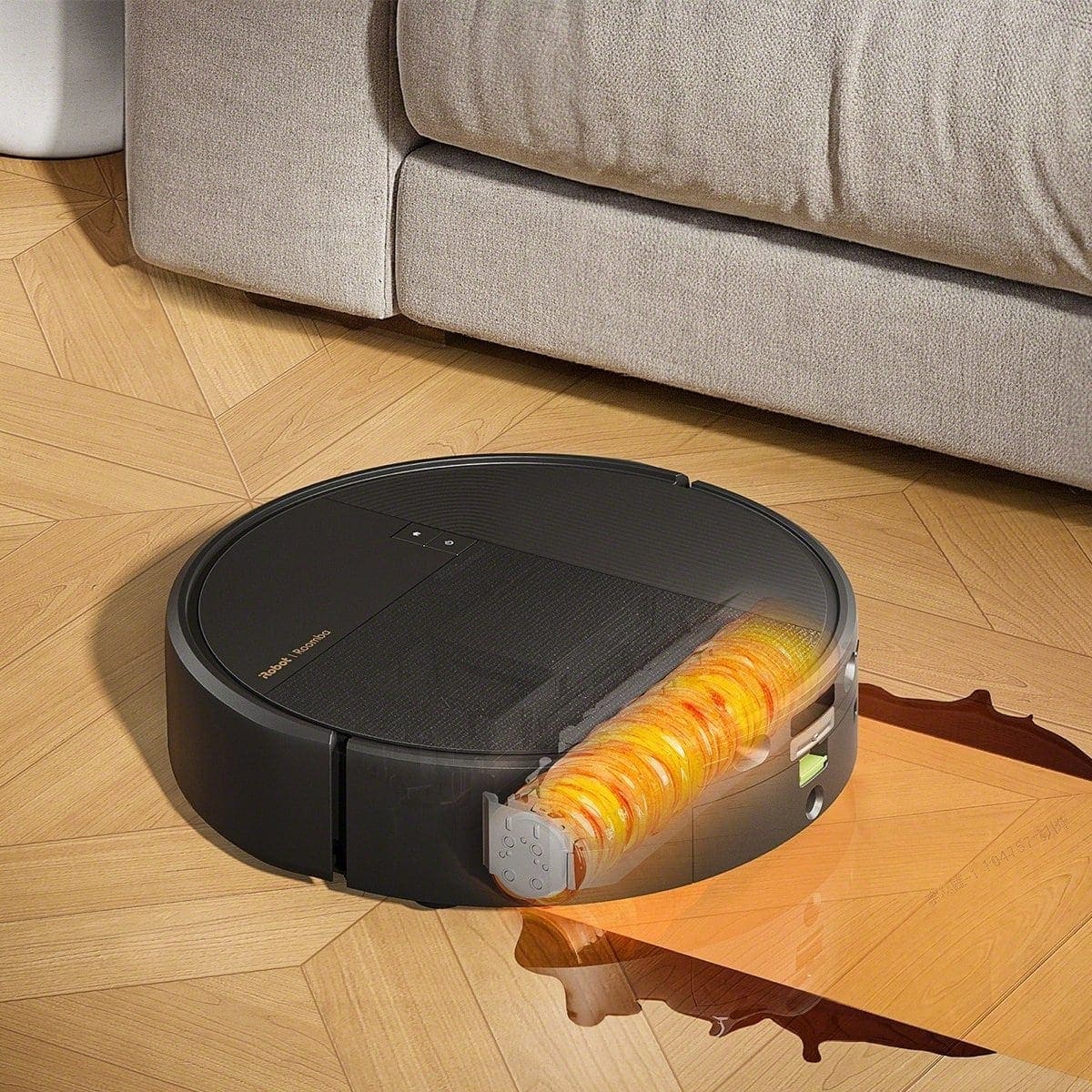 PowerSpin&trade; roller of the Roomba&reg; Plus 675 Combo robot scrubbing the floor with hot water