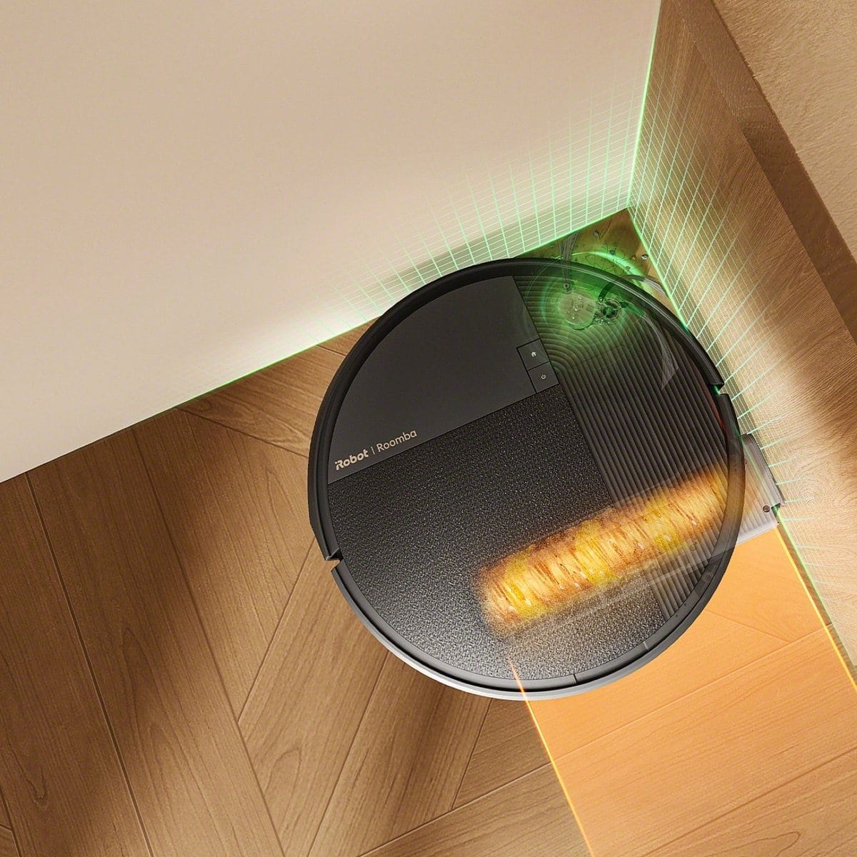Roomba&reg; Plus 675 Combo robot extending the mop roller to the wall and into corners